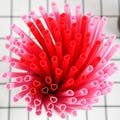 Valentine's Plastic Heart Straws in Pink or Red.